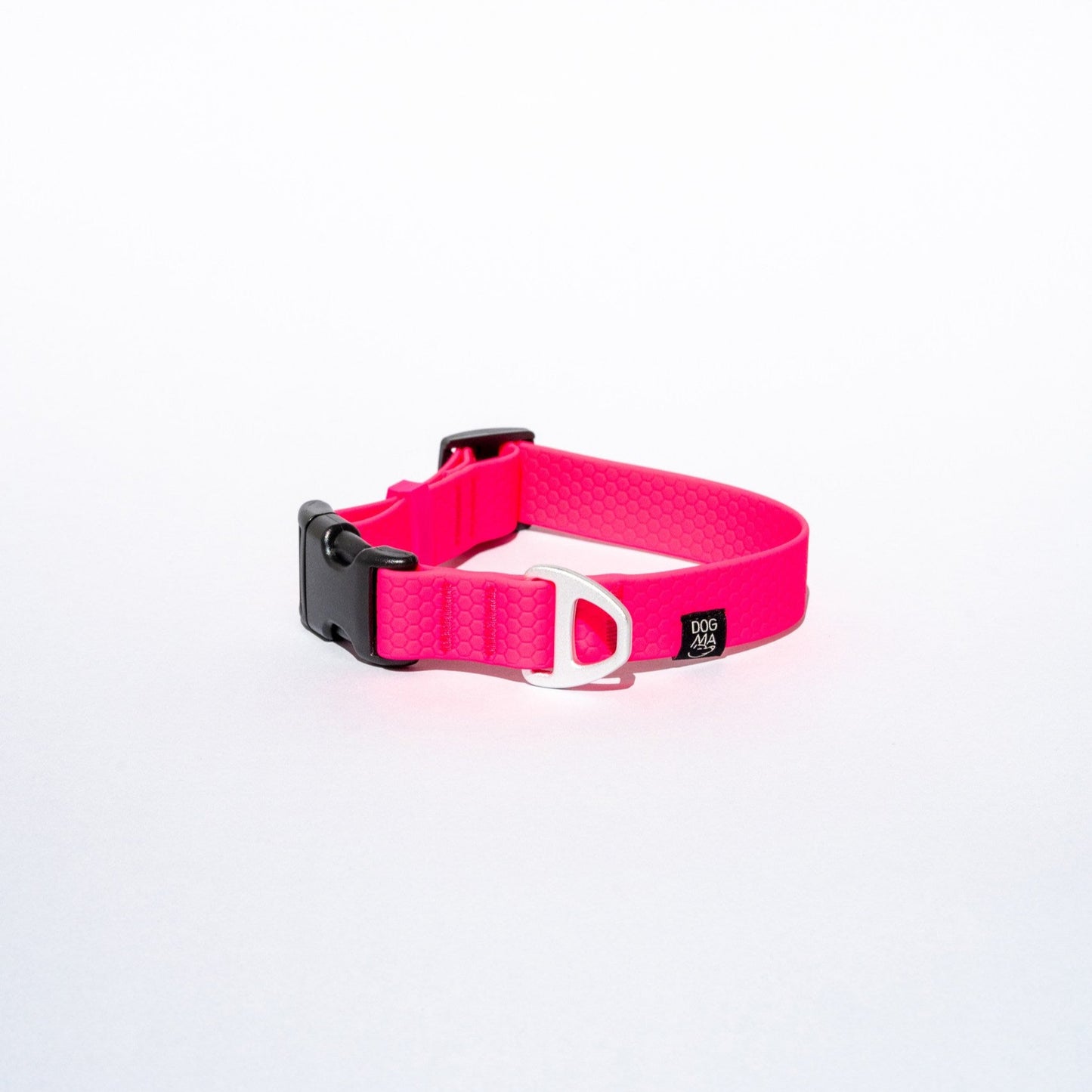Pink dog collar with a black buckle on a white background