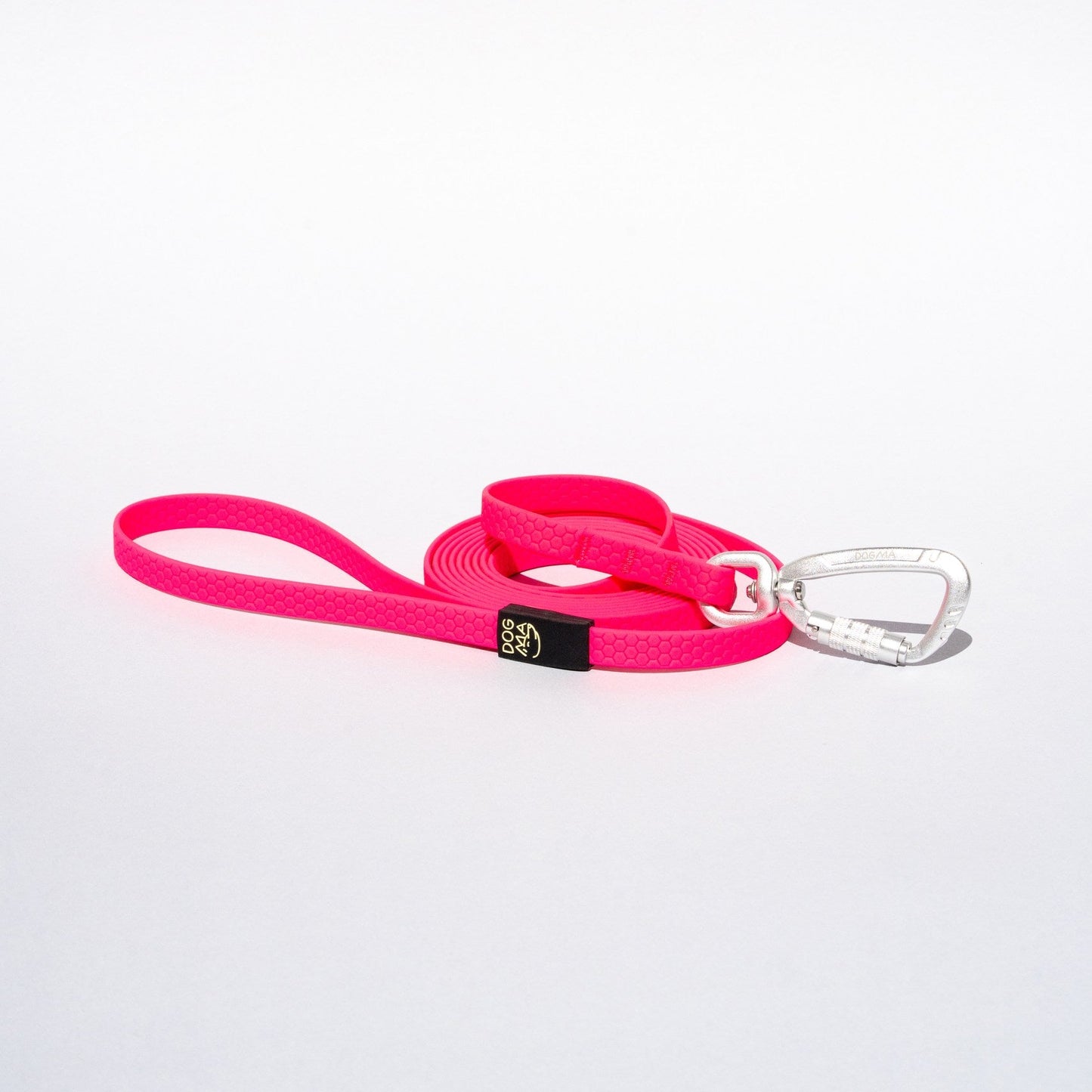 Pink dog leash with a silver clip on a white background