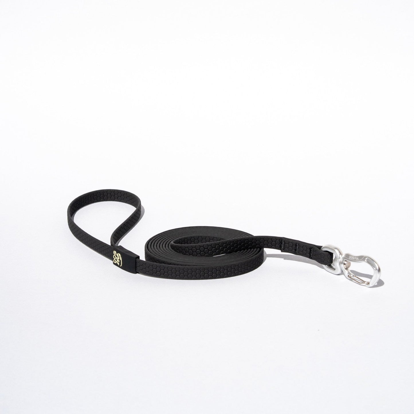 Black dog leash with a silver clip on a white background