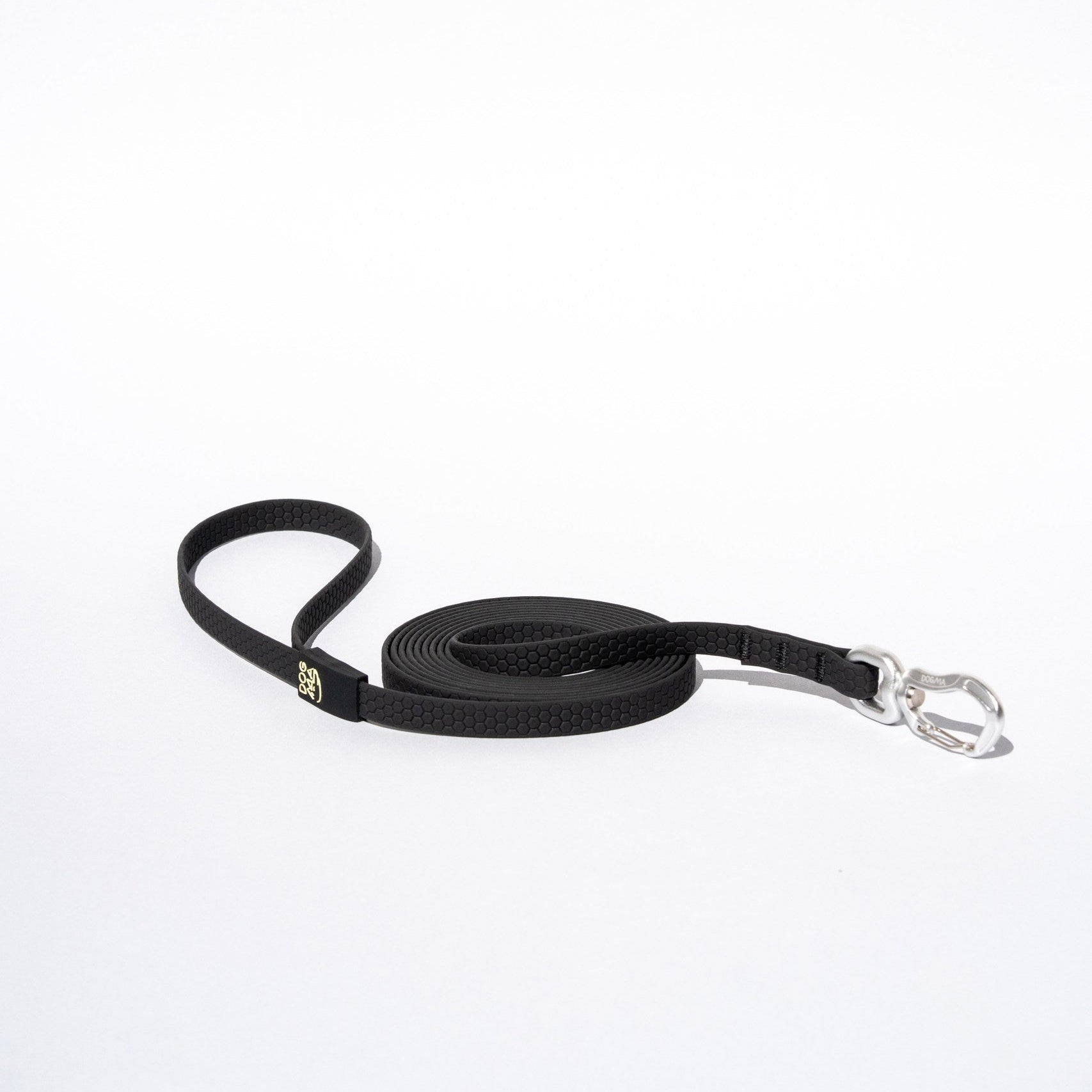 Black dog leash with a silver clip on a white background