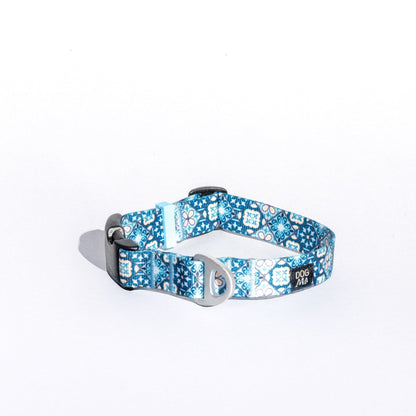 Dog collar with blue azulejo pattern on a white background